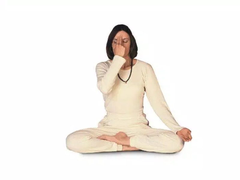 Practice breathing by Pranayama technique