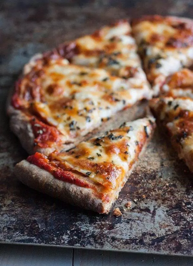 You should consider pizza as a dish to increase the number of vegetables in your daily diet. Vegetables are rich in vitamins, minerals and healthy fiber.